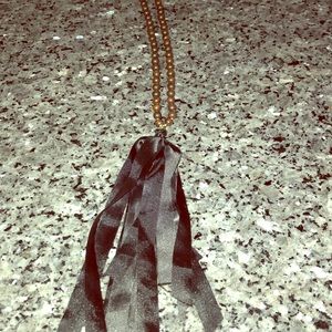 Boutique beaded fabric necklace . Brand new